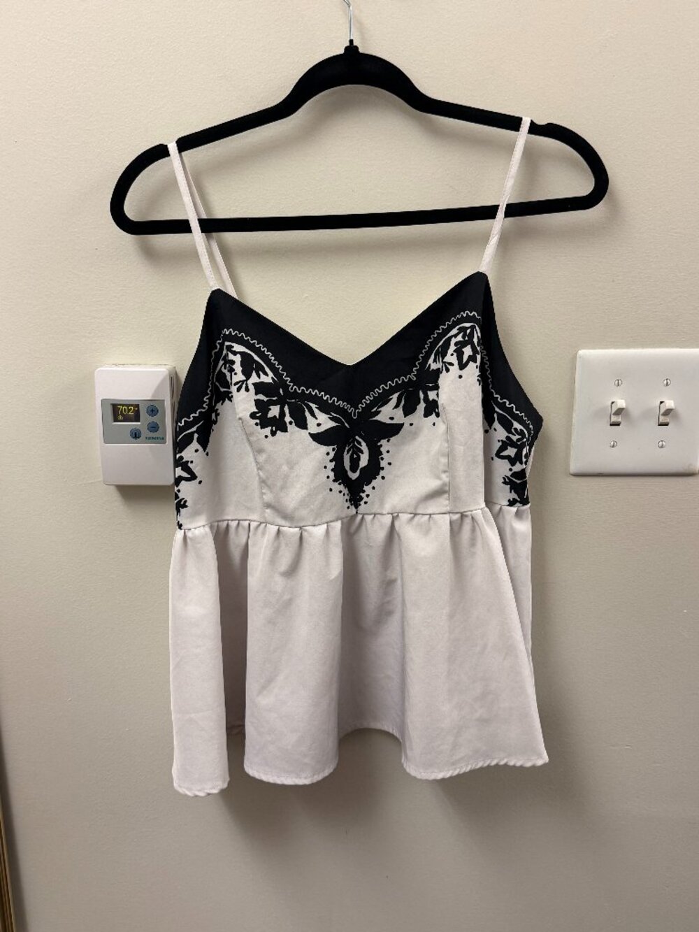 white blouse with black detailing